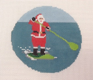 Sporty Santa Paddleboarder