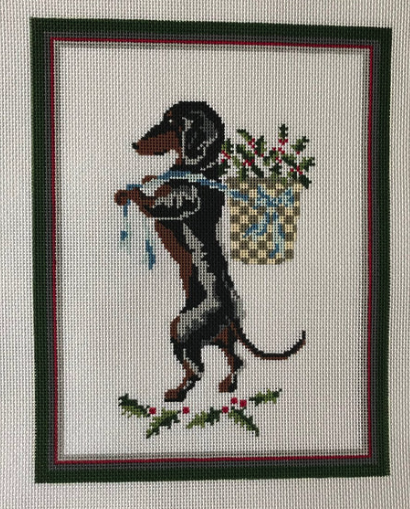 Gretel the Dachshund Bringing Xmas Holly